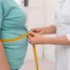 The effects of portfolio moderate-carbohydrate and ketogenic diets on anthropometric indices, metabolic status, and hormonal levels in overweight or obese women with polycystic ovary syndrome: a randomized controlled trial